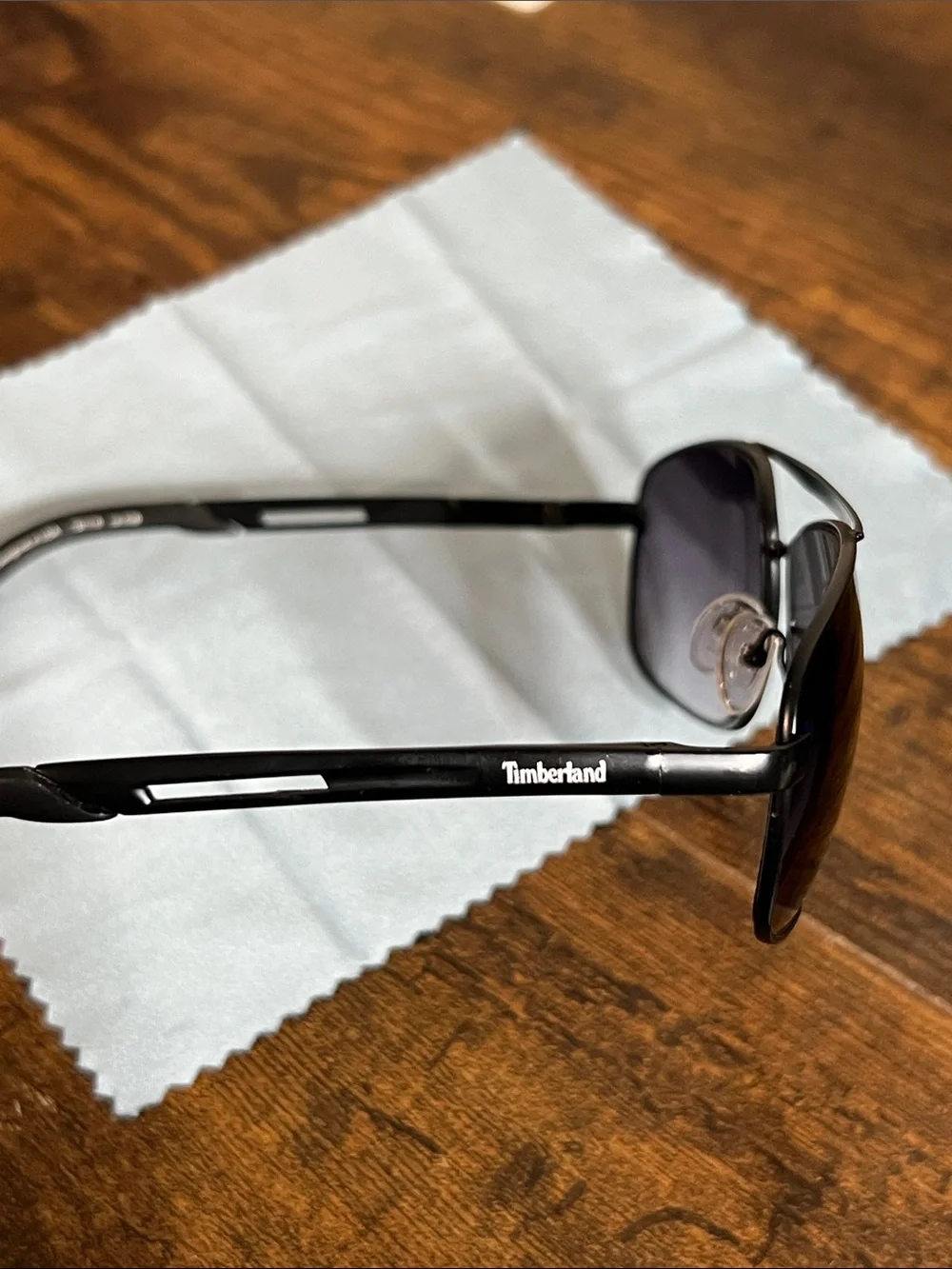 Timberland Black Frames with Dark Purple Lenses Aviator Sunglasses